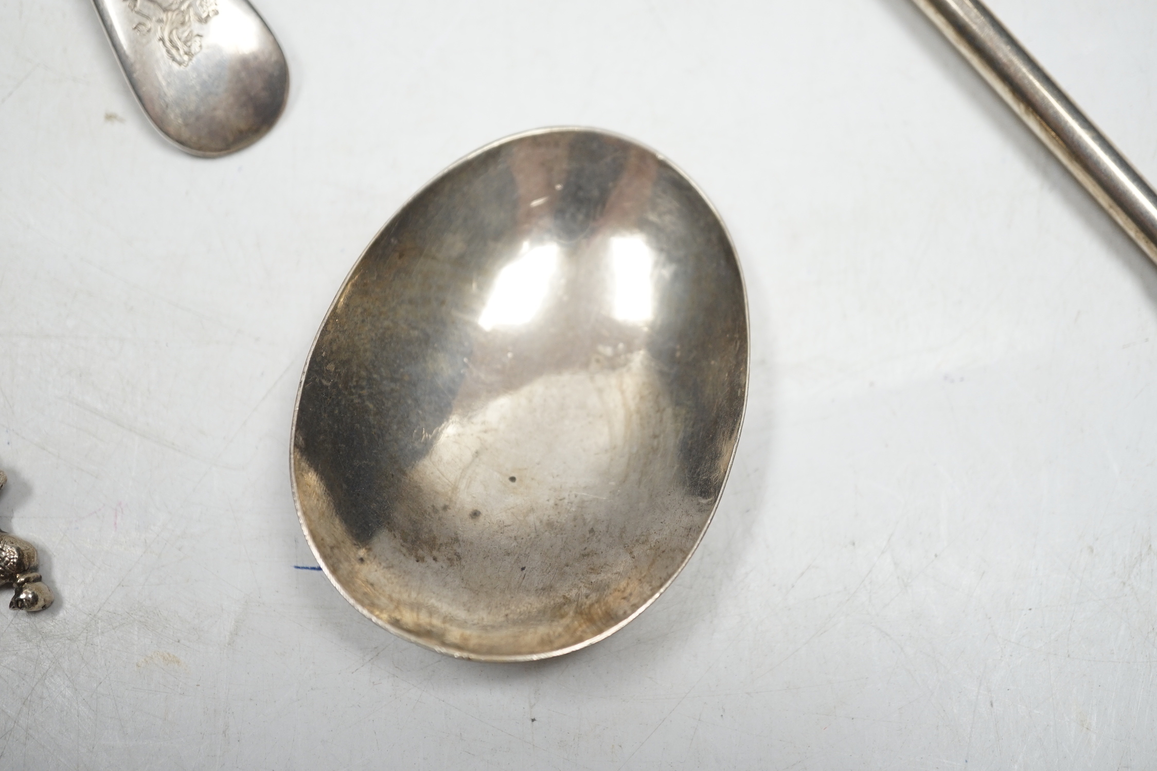 A George V silver biscuit server, a Dutch white metal combination fork and spoon and a late Victorian silver hunting horn, by Sampson Mordan & Co, London, 1900?, 30.2cm.